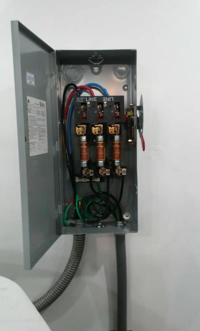 Three-phase disconnect switch installed for Smoke Detector Installation in Woodhull